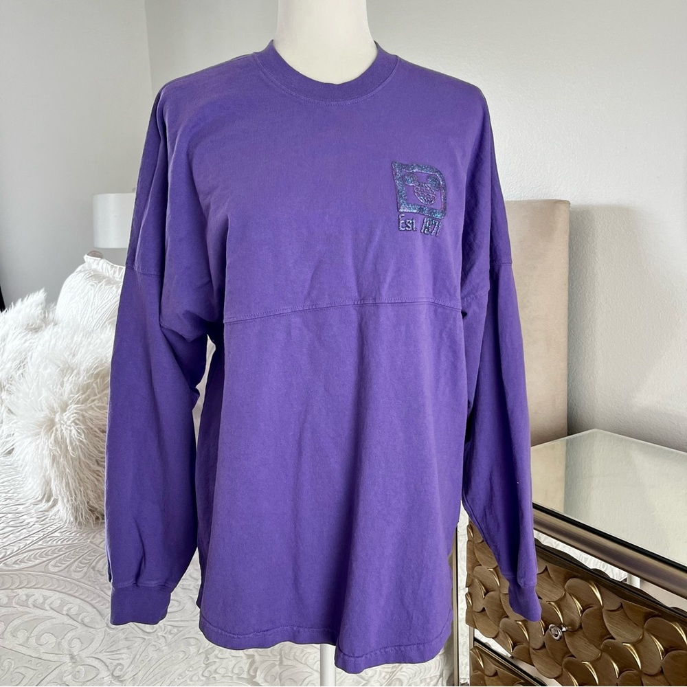 Disney Parks authentic loose fitting sweatshirt. Purple with puff lettering. S